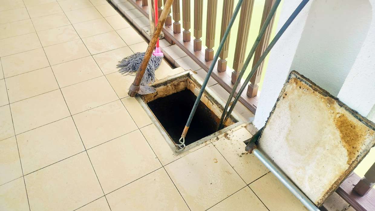 Sewer Camera Inspection in Kingston, NY — Interior floor access hatch to a drain line
