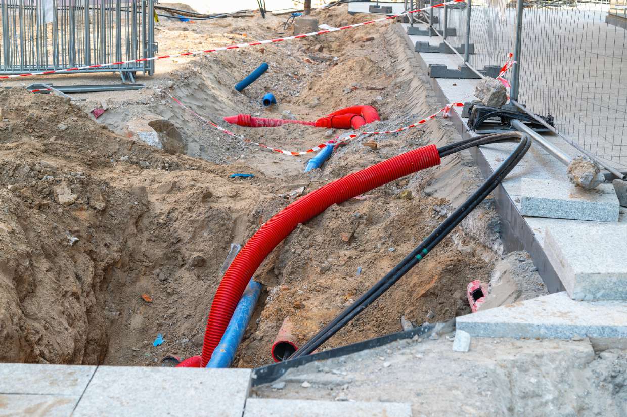 Sewer Camera Inspection project in Woodstock, NY — Trench with utility and drain conduit runs