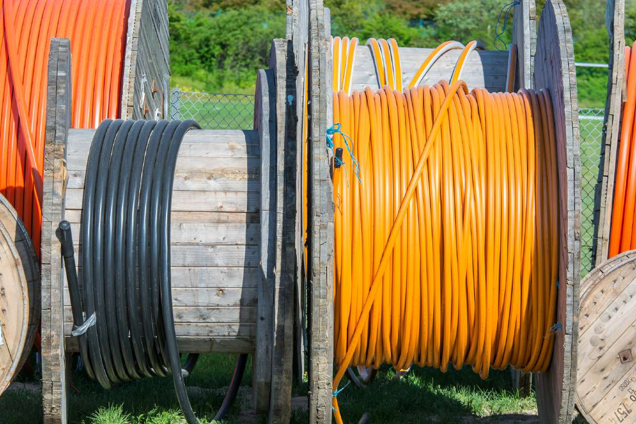 Septic Repair project in Kingston, NY — Pipe and conduit reels staged for a septic installation