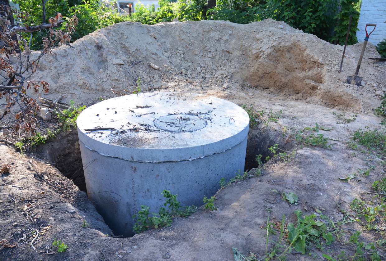 Concrete septic tank placed in an open excavation