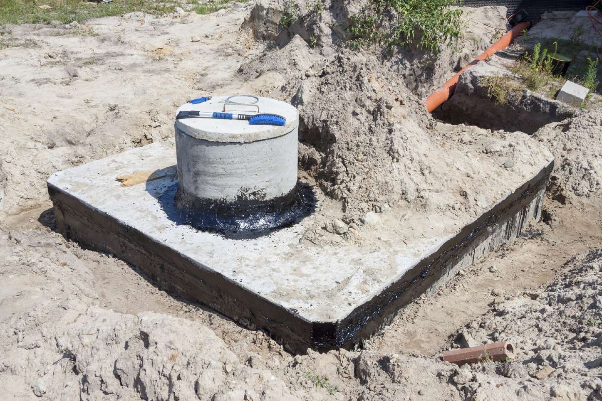 New septic tank set on a concrete pad